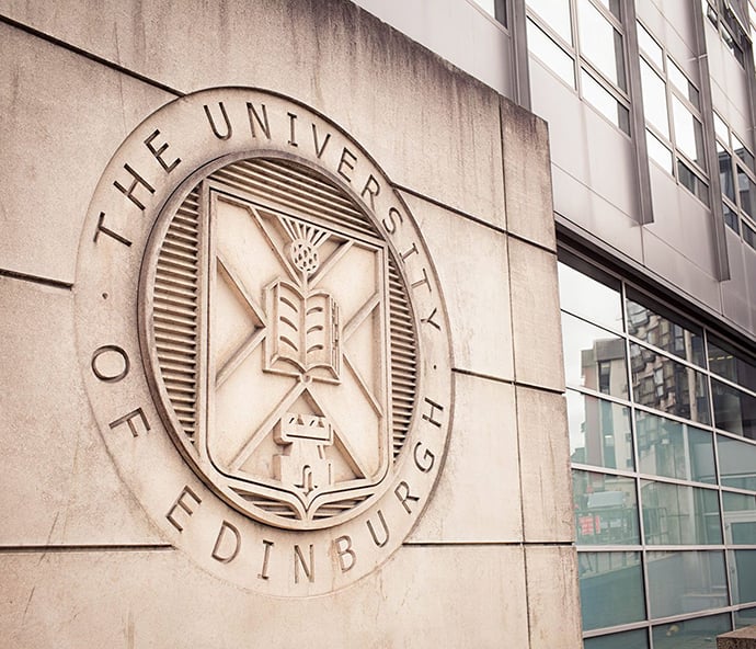 The University of Edinburgh logo on the side of a building.